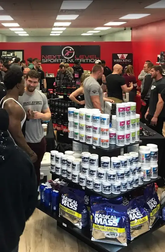 Customers at a Next Level Sports Nutrition in-store event in Middletown
